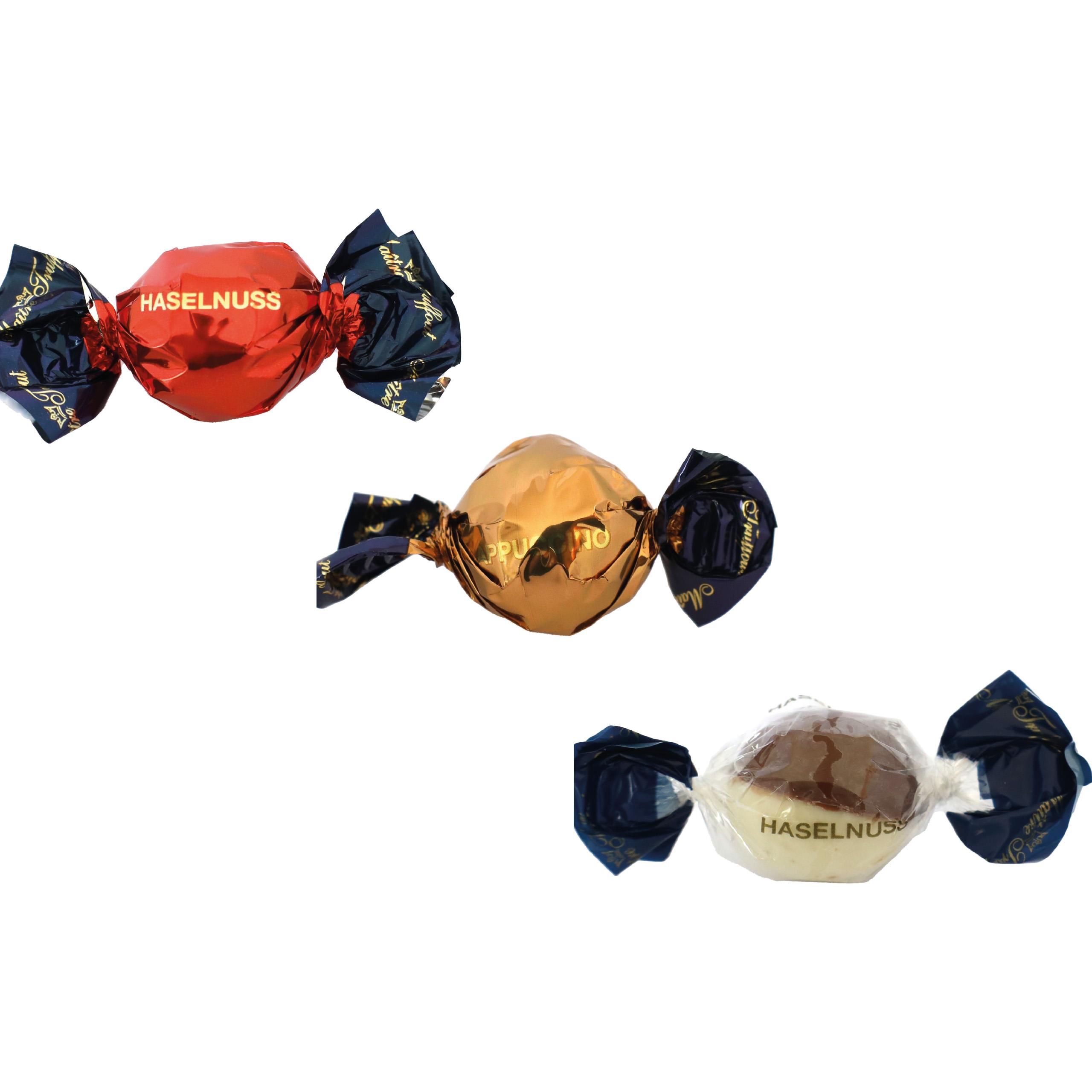 Weihnachtspralinés in Motivkartonage ´Tannenbaum´,   8 Stück, Inhalt: Pralinen Milchschokolade und weiße Schokolade mit Haselnusscremefüllung